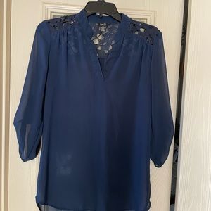 Navy, size sm Rue 21 blouse with button up sleeves. Yoke is hibiscus cut outs